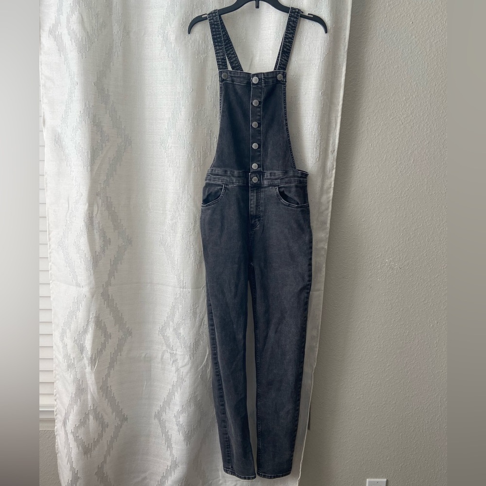Dark grey jean overalls for youth.